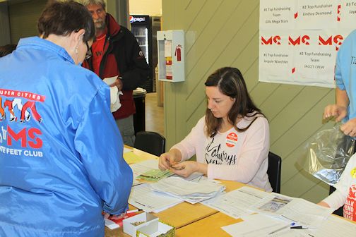 Volunteer Amanda Wencel (R) registers participants in the Kincardine MS Walk, May 1
